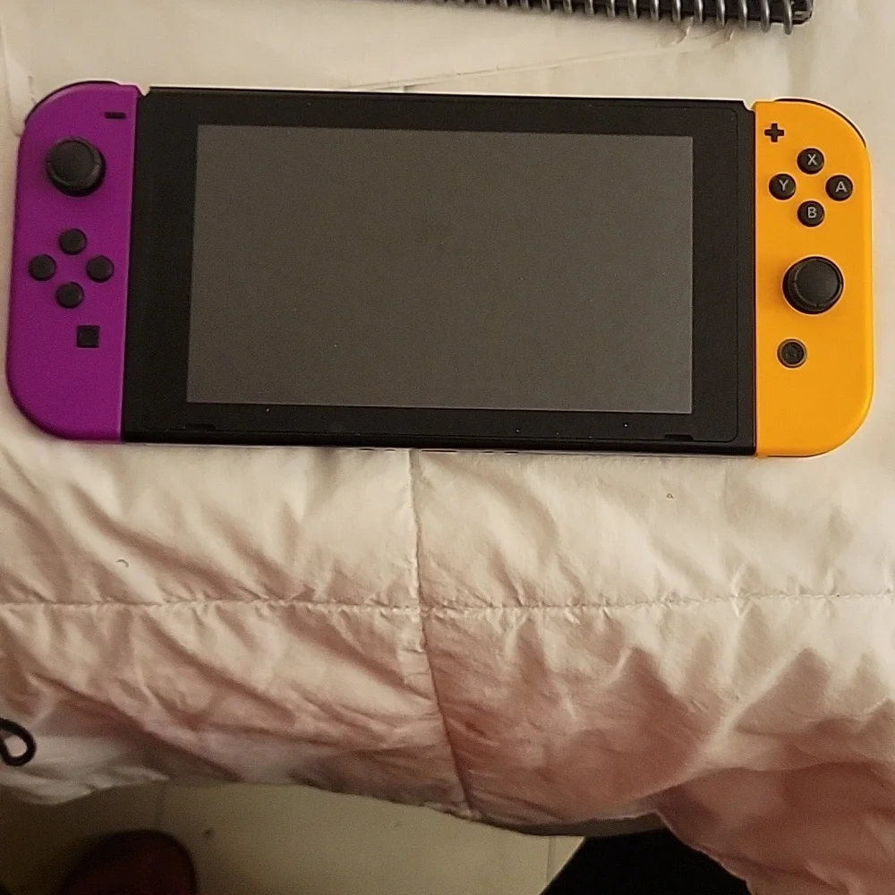 Nintendo Switch with all the accessories included.